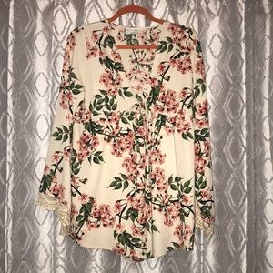 Floral long sleeved romper